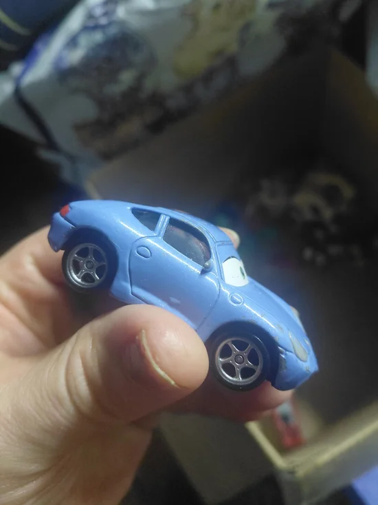 Disney Pixar Cars Sally Carrera diecast toy car.