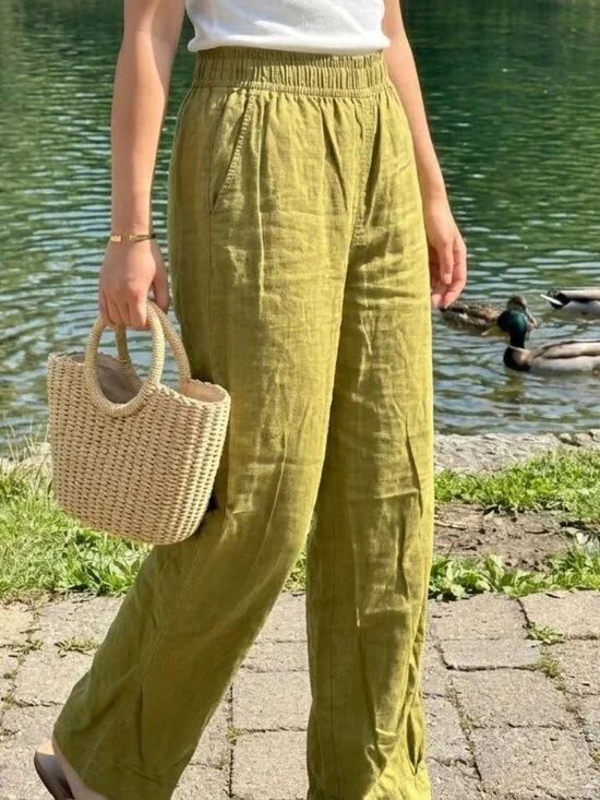 Green linen blend pants with cinched elastic waist and pockets