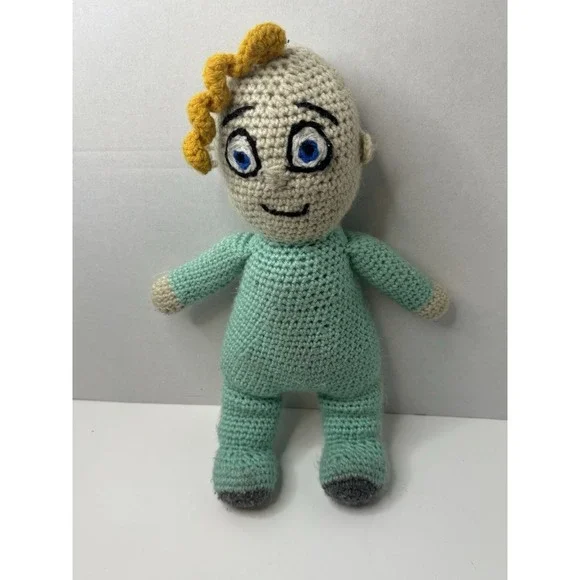 crochet doll of JJ from the children's‎ cartoon Cocomelon.