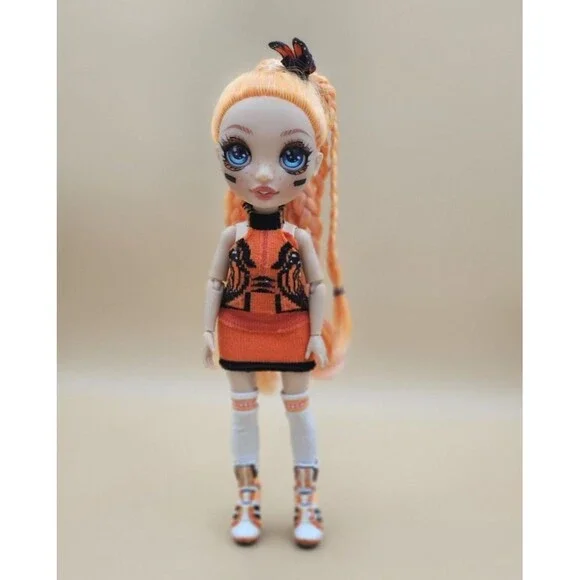 Rainbow High Junior Poppy Rowan Orange Fashion Doll Butterfly Monarch Bow