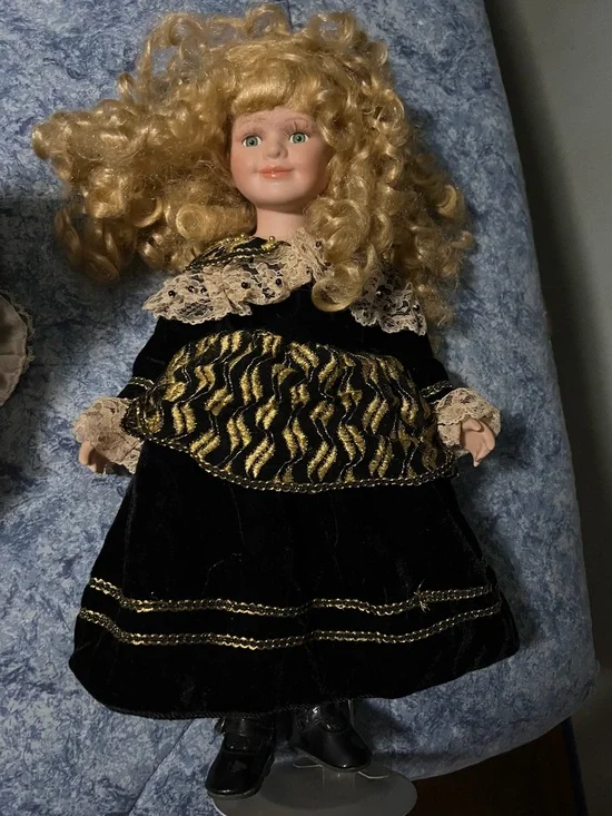 Porcelain Doll in Black and Gold Dress - Classic Collectible