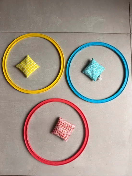 LOVEVERY Kids Ring Toss Set with Colorful Bean Bags - Yellow, Blue, Red