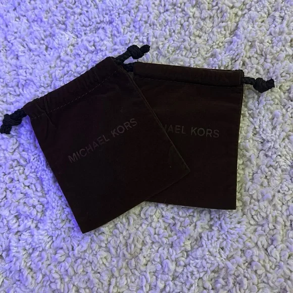 Two Micheal Kors Jewelry pouches!