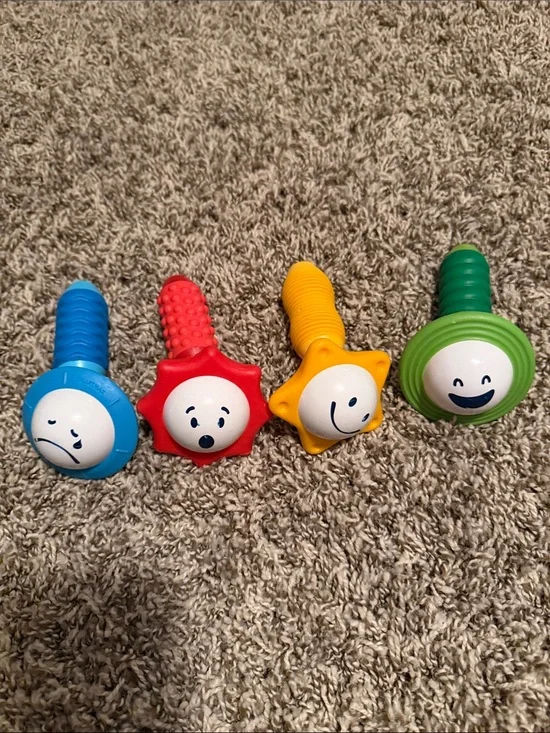 Colorful Smile Sensory Magnetic Rattle Set - Blue, Red, Yellow, Green