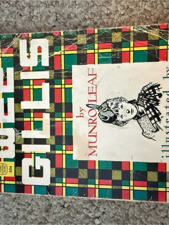 Colorful Plaid Graphic Book Cover with Red, Green, Yellow, Black