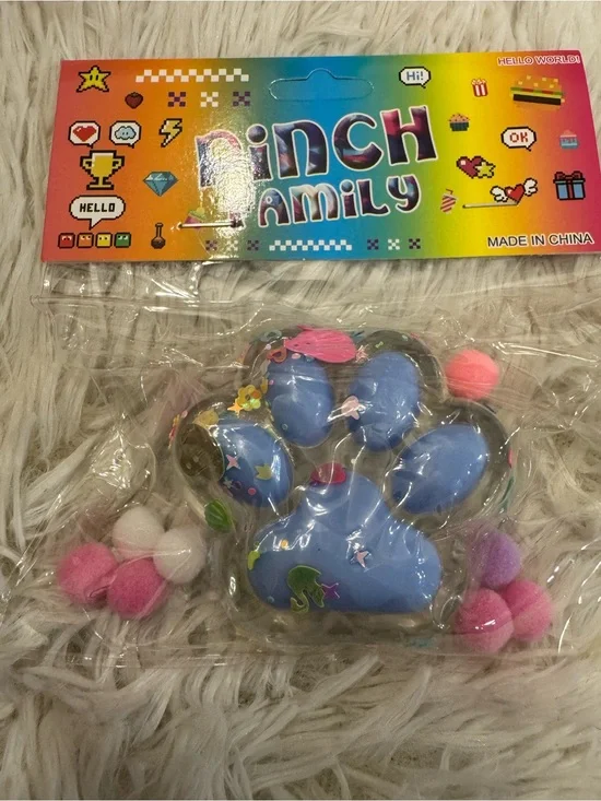 Blue Paw squishy with Pom Poms and confetti