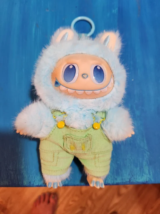 Blue Fuzzy Monster Lafufu Plush Keychain with Green Overalls