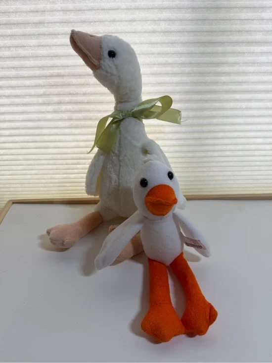 2 plush geese large unbranded. Small oriental trading