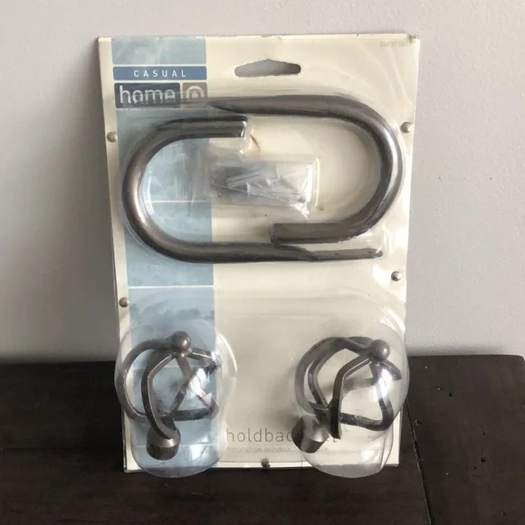 Decorative window hardware holdback set