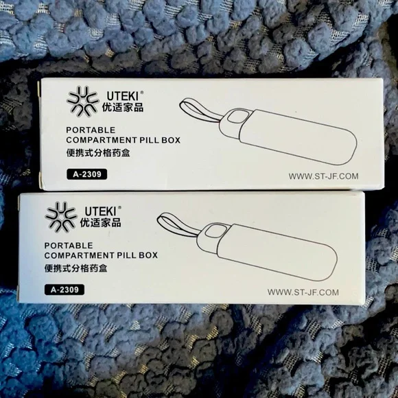 Portable pill box
