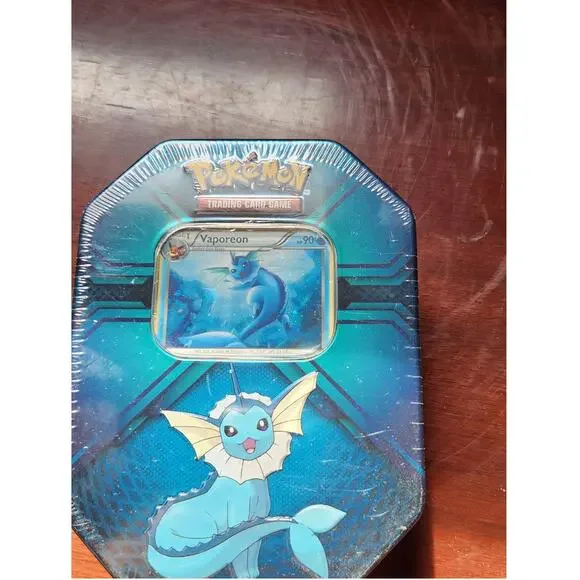 Pokemon TCG XY Triple Effect Tin Sealed Vaporeon Ancient Origins Roaring Skies