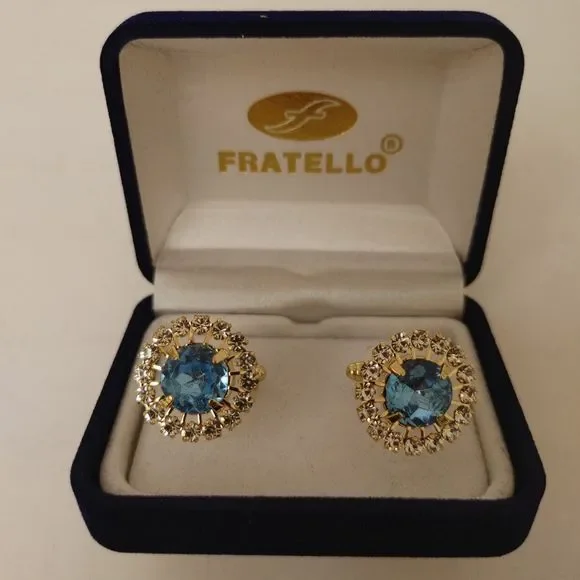 MEN'S FRATELLO GOLD CUFFLINKS WITH BLUE STONE SURRONDED WITH RHINESTONES.