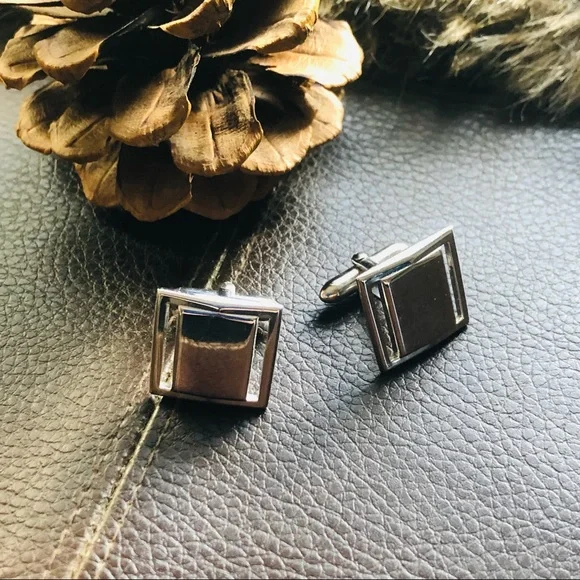 Vintage men’s Swank silver plated square cuff links