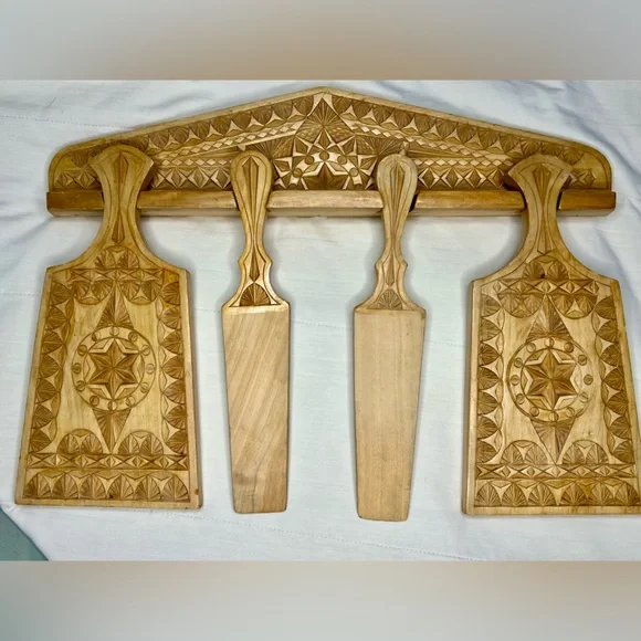 Handcrafted Wooden Wall Decor with Intricate Carvings