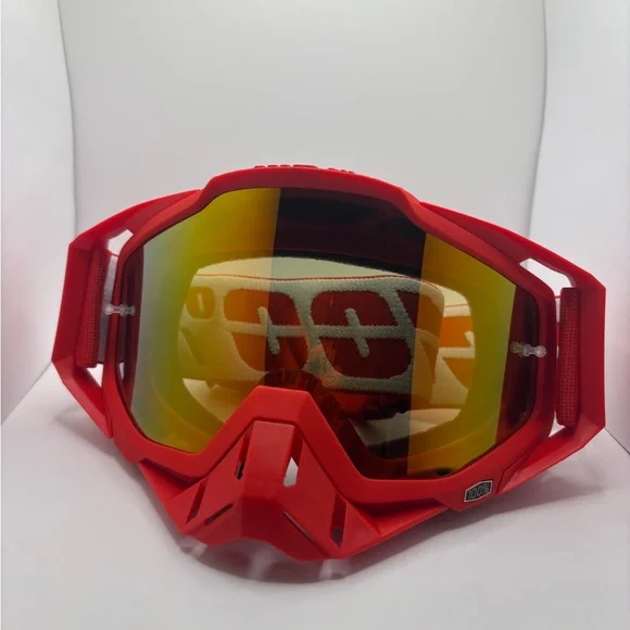 Red 100% goggles comes with peal offs and a removable nose guard