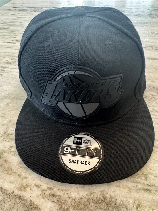 New Era 9Fifty Los Angeles Lakers Blacked Out Logo SnapBack Cap Hat Sports Team