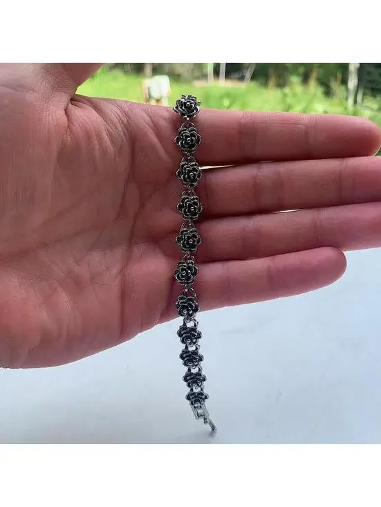 Y2k style gothic rose pedal pendant silver bracelet. Comes new. Unisex. Ships