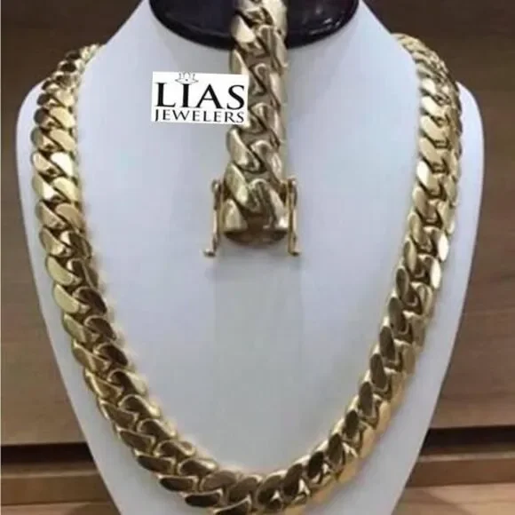 New 18k yellow gold Cuban link chain and bracelet 18mm thick