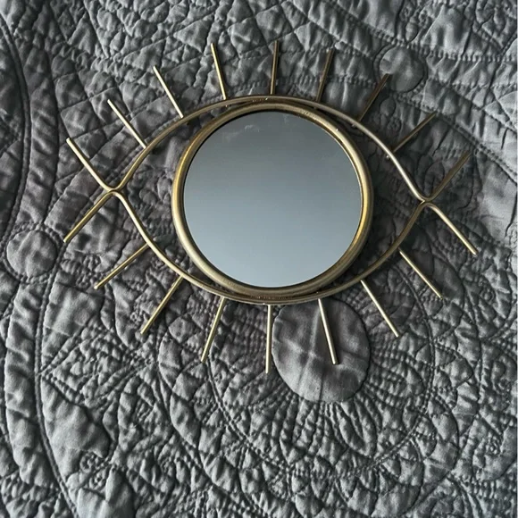 Like new gold metal eye mirror