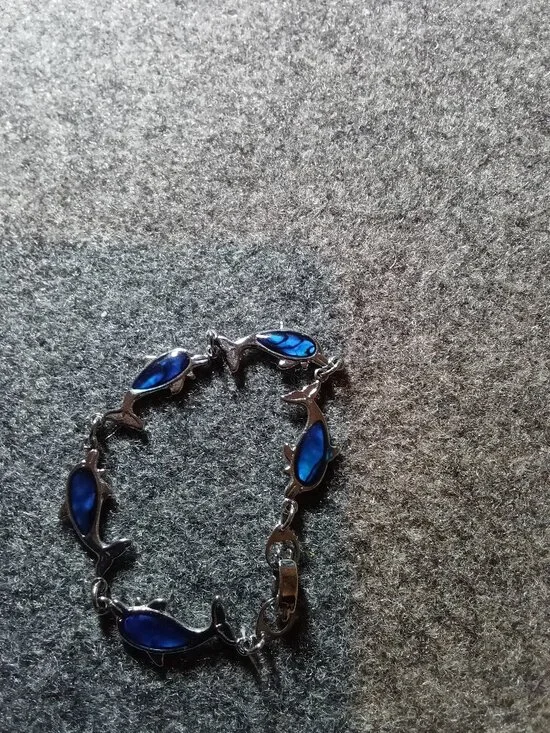 Dolphin Design Bracelet with Blue Accents