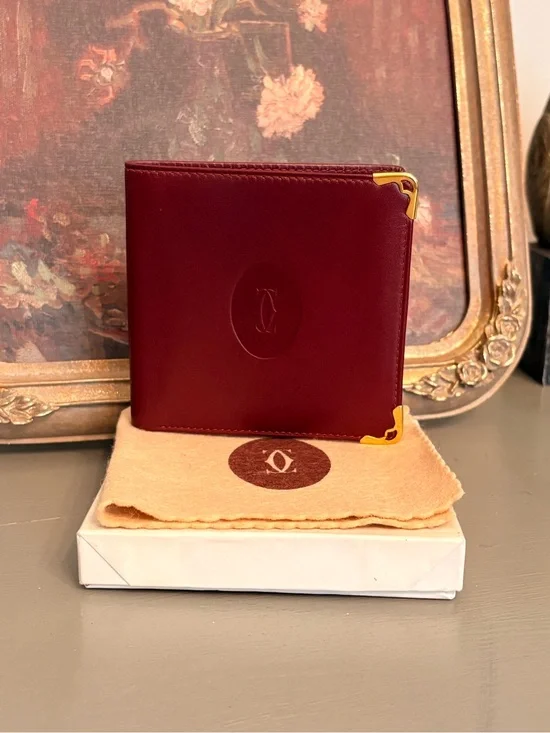 Cartier Burgundy Leather Men's Wallet with Gold Corner Accents