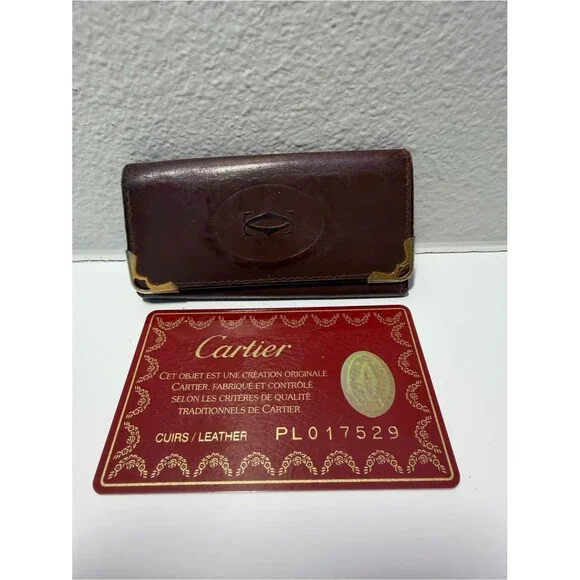 Cartier Brownish Red Leather Card Holder with Gold Corner Accents