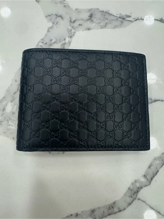 Gucci Black Embossed GG Leather Wallet