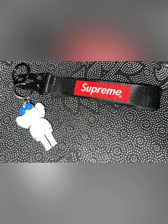 Supreme Red Logo on Black Speckled Fabric