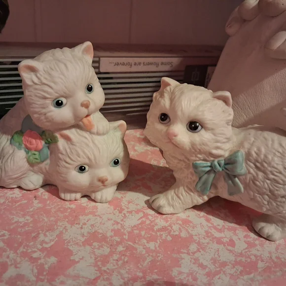 Charming White Cat Figurines with Blue and Pink Accents