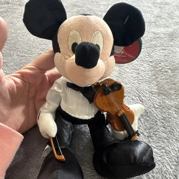 Mickey Mouse In A Tuxedo With A Violin Playing‎ A Violin
