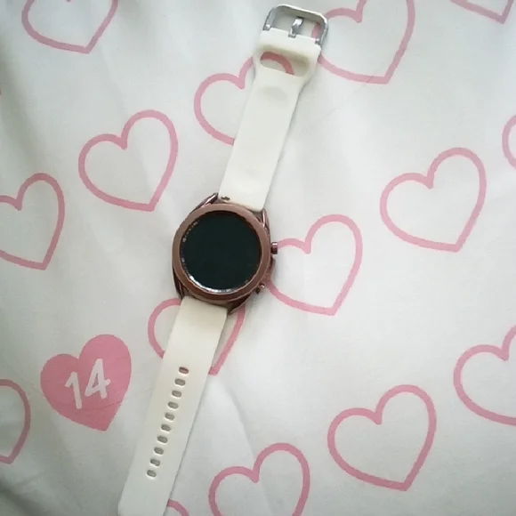 Samsung Smartwatch with White Band and Bronze Bezel