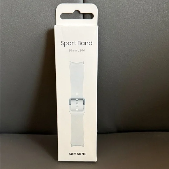 Samsung Sport Band in Soft Gray size S/M. Along with an additional sport band