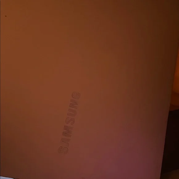 Samsung Silver Laptop with Vibrant Display