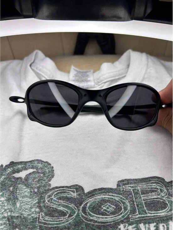 Black oval Sunglasses with Dark Lenses