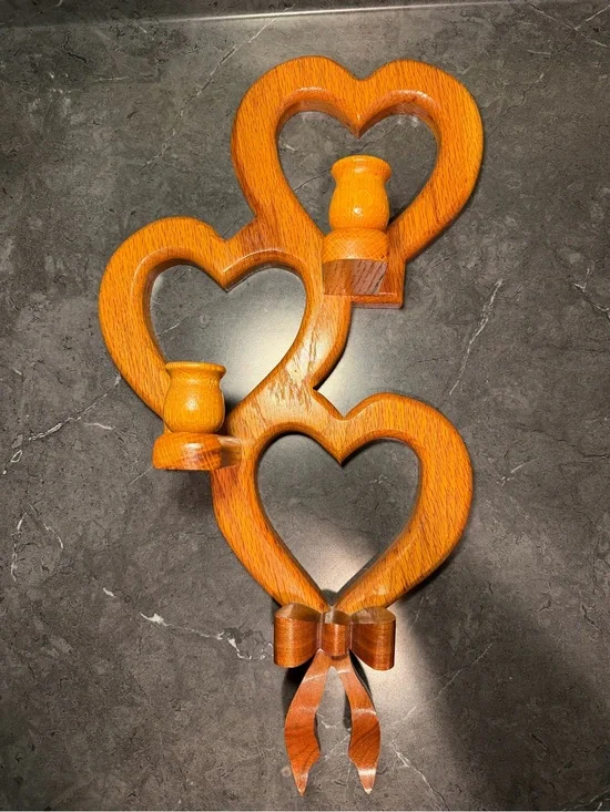 vintage wooden wall candle sconces. heart cutouts and bow details. Cottage-core