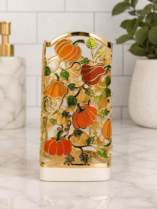 Bath & Body Works foaming soap holder features a festive gold metal pumpkin