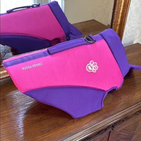 New High Tide life jacket by Canada Pooch for swimming. Pink and Purple. Size 18