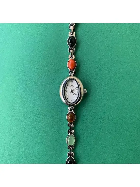Y2k style silver tone quartz watch with glass multi color jade stone opal