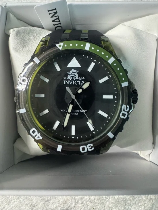 #141 Invicta Black Dial Watch with Green Bezel Accents