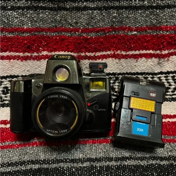 Canon Black and Silver Camera with Detachable Flash