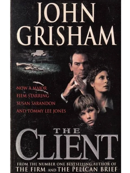 “The Client” a paperback novel by John Grisham
