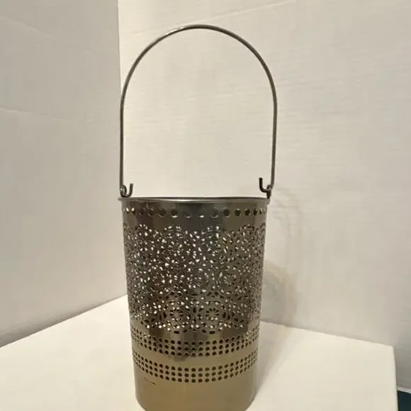 Beliani Corfu style Metal Lantern Holder in gold. Sparkle through cutouts.