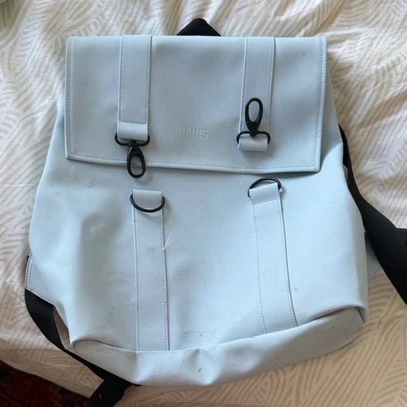 Rains Light Blue Waterproof Roll-Top Backpack with Black Hardware