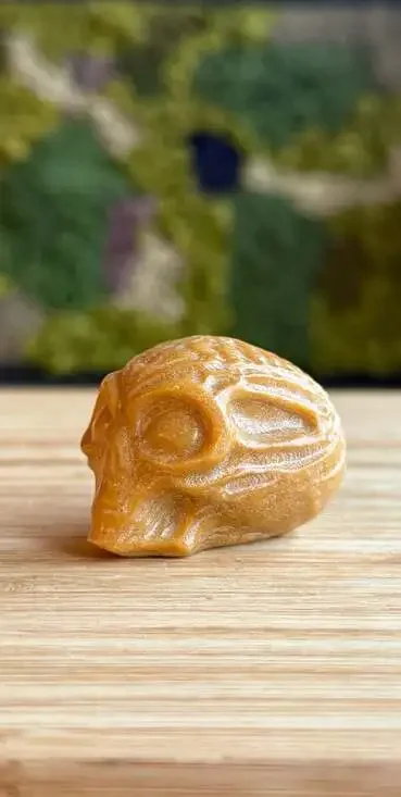 Hand Carved Yellow Calcite Crystal Alien Skull Figurine