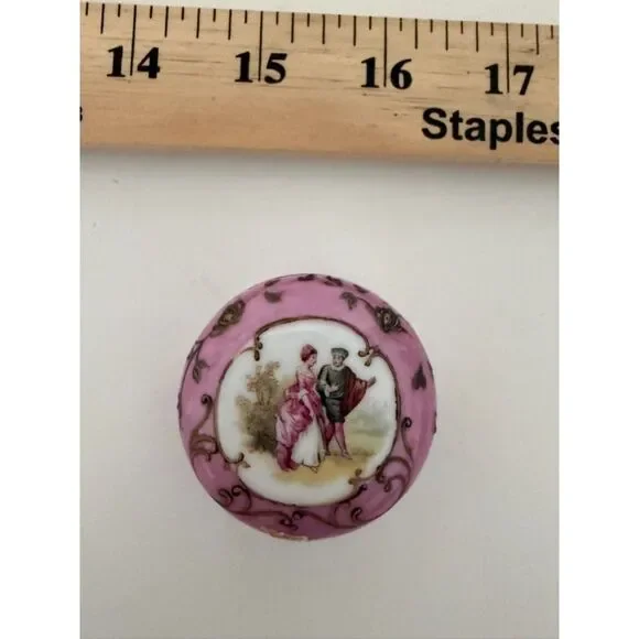 Vintage Limoges style trinket box with courting couple