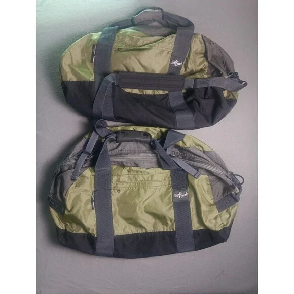 A Pair of Eagle Creek Travel Gear Green ES Cargo Duffel Bags Medium Cordura Read