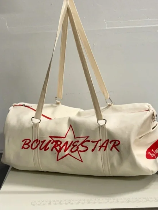Bourne Star Canvas Duffel Bag in Cream with Red Accents