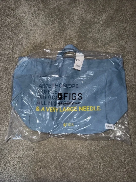 Figs Light Blue Duffel Bag with Yellow Logo Text