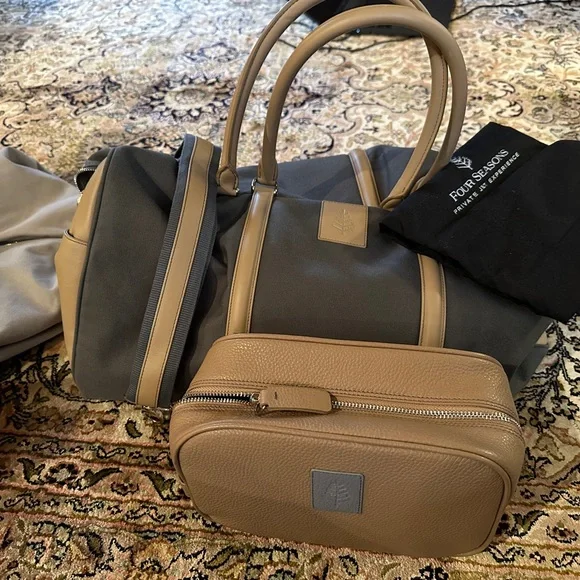 Exclusive Four seasons private jet experience duffel and toiletry kit.  BNWT