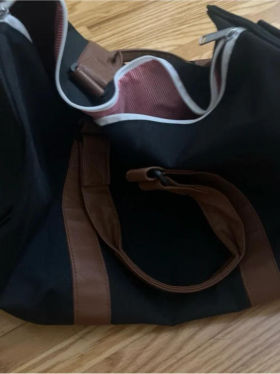 Herschel Supply Company Black Duffel with Brown Handles